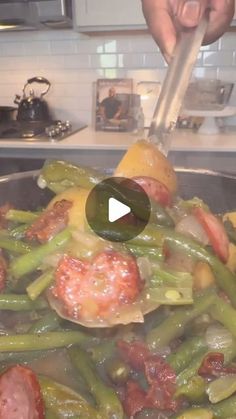 someone is cooking vegetables in a pan on the stove