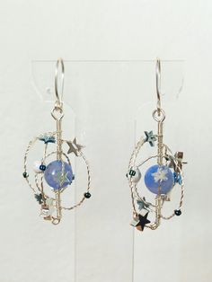 Collection 2023 -Beautiful celestial earrings  inspired by earth, moon & stars. "You are my earth, to you I am just a moon..." Moon Lyrics by Jin Made manually with brass wire, agates, stars and more. You can change the wire with silver plated or gold plated wire ---IMPORTANT INFORMATION---2023 GIFTS: If your order is a gift for birthday or holidays, keep in mind that for the standard delivery I am currently unable to guarantee shipping or delivery dates due to the world situation, you must orde Moon Lyrics, Moon Earth, Stars Earrings, Galaxy Earrings, Planet Earrings, Earrings Moon, Celestial Earrings, Moon Moon, Moon Stars