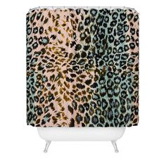 a shower curtain with an animal print pattern on the front and back of it,