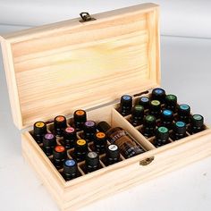 Wooden Essential Oil Box Bring organization and beauty to your essential oil collection with our Essential Oil Wooden 24+1 Compartment Slots Storage Box. Crafted from high-quality natural wood, this storage box is the perfect solution for keeping your essential oils neat, tidy, and easily accessible. With 24 regular compartments and one bonus large compartment, this storage box provides ample space for storing and organizing your essential oils. The slots are perfectly sized to fit most essential oil bottles, making them ideal for small and large collections. Each compartment is lined with soft velvet to protect your precious oils from scratches and damage. Features: Essential Oil Box Storage Material: Pine wood - durable to use, corrosion resistant Protects essential oils from the sun Siz Essential Oil Storage Box, Essential Oils Organization, Essential Oil Box, Essential Oil Holder, Essential Oils Collection, Calming Essential Oils, Essential Oil Storage, Organization Essentials, Flower Lamp