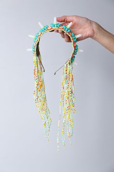 Colorful beaded headband with free falling tassels made of gemstone and glass beads. Unique and one of a kind jewelry design. From 2016 jewelry collection. Headband was made of: Crystal glass beads. Seed beads. White quartz beads. Animal friendly fabric on the back, gentle to the skin. FREE SHIPPING. We offer fast shipping. Europe 1 - 2 days after dispatch. Word wide 2 - 5 days after dispatch. CUSTOM ORDERS. I love doing custom orders! Please contact me with your requests. Special orders are pri Beads Headband, Beaded Hair Jewelry, Beaded Wig, Headband Design, Beads Accessories, Beaded Headpiece, Festival Headpiece, Beaded Crown, Unique Hair Accessories