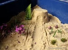 the sand is made to look like it has plants growing out of it