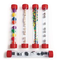 an assortment of different colored pencils and markers in plastic tubes on a white background