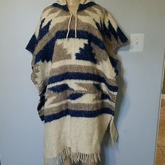 Beautiful Unisex Wool Poncho. Never Worn. Cream Casual Poncho, One Size Fits All, Cream Casual Poncho One Size, Casual Beige Long Sleeve Cape, Cream Poncho For Fall Beach Trips, Casual Cream Poncho For Fall, Cream Poncho For Beach In Fall, Casual Oversized Cream Poncho, Casual White Hooded Poncho, Casual Cream Poncho