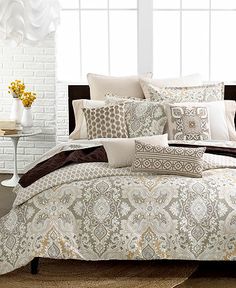 the comforter is neatly made and ready to be used in the bedroom or living room