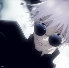 an anime character with pink hair and blue eyes looking at his laptop computer while wearing sunglasses