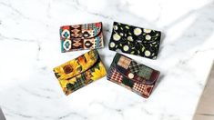 These cute wallets are perfect for holding gift cards for birthdays, graduations, anniversaries, and more! It makes a great stocking stuffer! Measures 4" x 3"  with 2 slots for multiple cards, DL, or cash.  Has a KAM snap closure for the front flap. Each holds about 20 business cards or about 12 credit cards, store loyalty cards, shopping cards, or gift cards.  They make great little wallets in your pocket and are perfect for organizing your purse. These cute cardholders will make a cherished gift for your co-worker or employee. And you can add a gift card to make a lovely present! The card wallets are interfaced for structure and lined with a coordinating fabric. All seams are reinforced at the stress points.  Has a KAM snap closure for the front flap. Ready to ship and you will receive t Cute Rectangular Card Holder For Daily Use, Casual Card Holder Gift, Casual Rectangular Card Holder For Daily Use, Casual Card Holder For Daily Use, Casual Rectangular Coin Purse With Card Slots, Casual Card Holder As Gift, Multicolor Rectangular Card Holder With Card Slots, Multicolor Rectangular Card Holder With Slots, Retro Wallets With Card Slots For Gift