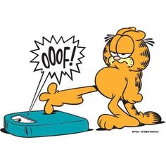 the garfield cat is trying to get out of his litter box with its paw in it