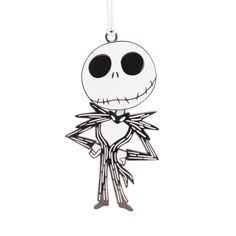 a keychain with a skeleton wearing a suit and bow tie on it's neck