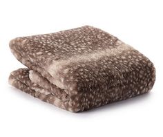 a blanket that is made out of brown and white fur