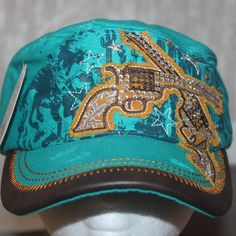 Nwtag: Turquoise Cap With Leather Brown Brim, This Cap Has Gold Guns Embroidery On It. Casual Blue Hats For Rodeo, Blue Snapback Hat For Rodeo, Casual Turquoise Cap Hat, Casual Turquoise Cap, Blue Cap For Rodeo, Turquoise Hats With Short Brim, Cowgirl Necklaces, Chanel Hat, Beige Hat