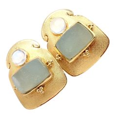 About This Piece: These rare vintage Paula Crevoshay earrings are one-of-a-kind (OOAK) pieces crafted in 18k gold. They feature stunning smithsonite and moonstone gemstones, showcasing Crevoshay's unique artistry.  Elegant and distinctive, these earrings are a testament to exquisite craftsmanship, making them a valuable addition to any fine jewelry collection. Metal: 18k Yellow Gold Measurements: 22.5mm x 29mm Weight: 23.5 grams Stones: 2x Smithsonites: 14mm x 9mm  2x Moonstones: 6mm Hallmarks: Moonstone Gemstones, Chanel Ring, Watch Cufflinks, Hermes Jewelry, Moonstone Earrings, Fine Jewelry Collection, Fine Jewellery Earrings, Moon Stone, Ring Earrings