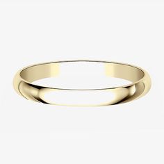 a yellow gold wedding ring on a white background