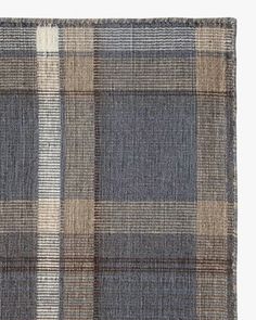 a blue and beige plaid pattern on a white background