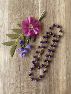 Beautiful rich deep purple round 6 mm. faceted amethyst stones in this 18" rosary chain necklace with 14K gold-filled lobster claw clasp. Amethyst is February's birthstone! Amethyst is a 'powerhouse' stone. It vibrates at a high frequency warding off negative energy and offering spiritual protection. It awakens higher consciousness facilitating meditation, intuition and wise decision making. Associated with the CROWN chakra; it works wonders for Pisces & Aquarius zodiac signs. - Semi-precious stones are natural from the Earth! Variations in size, color and natural inclusions make each stone unique! - Jewelry care card included. - Handmade in the U.S.A. Pisces Aquarius, Jewelry Care Card, Rosary Chain Necklace, February Baby, Pisces And Aquarius, Amethyst Stones, Spiritual Protection, Higher Consciousness, Rosary Chain