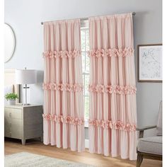 pink curtains with ruffles and flowers on them