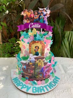 a birthday cake decorated with pictures and decorations