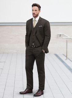 Stay on-trend and enhance your fashion prowess with our impeccably chic Loro Piana Giulio Wool Suit. Fashioned from the finest pure wool, this suit boasts a steadfast solid pattern that seamlessly blends with its understated brown tone. The lavish fabric not only enhances the overall aesthetic but also provides a comforting layer, making it a luxurious and stylish choice for those with discerning tastes. Whether you're attending business meetings or social gatherings with friends, this suit emer Tailored Tweed Jacket For Business Casual, Tailored Wool Suits For Semi-formal Occasions, Tailored Elegant Tweed Jacket For Business Casual, Tailored Tweed Jacket In Elegant Style, Tailored Elegant Tweed Jacket, Elegant Wool Three-piece Suit, Single Breasted, Elegant Wool Three-piece Suit Single Breasted, Elegant Single Breasted Wool Three-piece Suit, Elegant Business Casual Tweed Jacket With Suit Collar