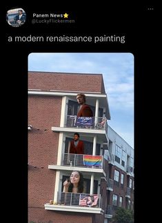 two people are standing on the balconies of an apartment building and one is holding a rainbow flag