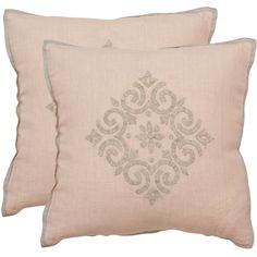 two pillows with embroidered designs on them, one in pink and the other in beige