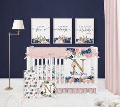 a baby's room with blue walls and floral decor, including a crib