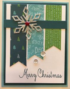 a christmas card with a snowflake on it