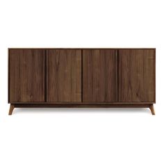 the sideboard is made from wood and has three doors