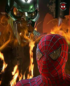 two spider - man are in front of some flames