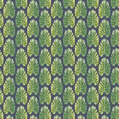 a green leaf pattern on a blue background