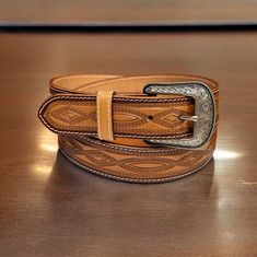 ➤Custom engraving option ➤ Single Piece Leather ➤100% full grain genuine leather ➤ Easy Snap System for Interchanging Buckles ➤ Stainless Steel Buckle ➤ 1-1/2" WIDE ➤Belt thickness 3.2 mm - 1/8" thickness Tooled Western Floral Engraved Leather Belt 100% Genuine Full Grain Cowhide with Snaps 1-1/2" WIDE Personalized Belt that serves as a great gift for your loved one. You can choose to personalize this belt, making it an Engraved Belt. This is a handmade western leather belt. Stamped Leather Belt, Belt Making, Belt With Buckle, Cowboy Belt, Western Leather, Suspender Belt, Wide Belt, Custom Engraving, Rodeo