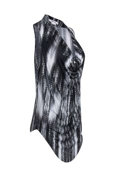 Unleash your wild side with this Helmut Lang cowl neck top in black, white, and dark grey muted snakeskin print. Perfect for a night out or a fun date night, this sleeveless top will add a playful and unexpected touch to your outfit. Pair with your favorite leather pants and bold pumps for a daring look! Size S Made in USA 100% Viscose Cowl neckline Sleeveless 'U' shaped hem Bust 36" Waist 34" Shoulder to hem (longest point) 33" Black Cowl Neck Top For Night Out, Black Cowl Neck Top For Party, Black Cowl Neck Top For Evening, Cowl Neck Top, Cowl Neckline, Snakeskin Print, Helmut Lang, Cowl Neck, Snake Skin