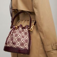 New! Classic Tory Burch T-Monogram Chenile Bucket -Large Claret (Burgundy) New With Dust Bag! Chenille, Eel Skin Brass-Finish Hardware; Ecru Stitching Throughout Zipper Closure Leather Top Handles With 3.8" (9.5 Cm) Drop Adjustable, Removable Crossbody Strap With 21.7" (54.5 Cm) Drop Easy-To-Clean Microsuede Lining Size: Height: 8.4" (21 Cm); Length 8.4" (21 Cm); Depth 4.8" (12 Cm) Tory Burch Bucket Bag, Top Handle Handbags, Tory Burch Bag, New Classic, Burgundy Color, Crossbody Strap, Leather Top, Pretty Dresses, Tory Burch