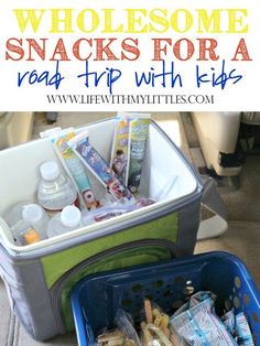 an open suitcase with snacks in it and the words wholesome snacks for a road trip with kids