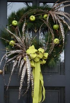 a wreath is hanging on the front door