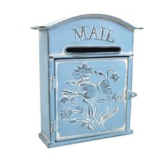 a blue mailbox with flowers painted on it's front and the word mail