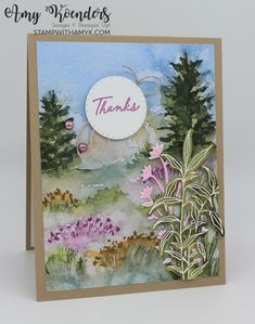 a handmade thank card with watercolor flowers and trees in the background that says, thanks