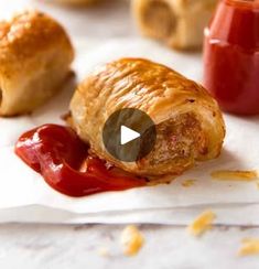 an image of pastries with ketchup on the table