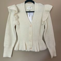 Line & Dot Peplum Cream Cardigan With Ruffle Detailing. Size Small. Nwt. Comes With Extra Buttons. Never Been Worn. White Ruffled Cardigan For Fall, Cream Ruffled Cardigan For Fall, White Casual Cardigan With Ruffles, White Casual Ruffled Cardigan, Casual White Ruffled Cardigan, V-neck Ruffled Winter Cardigan, Peplum Cardigan, Peplum Sweater, Line Dot