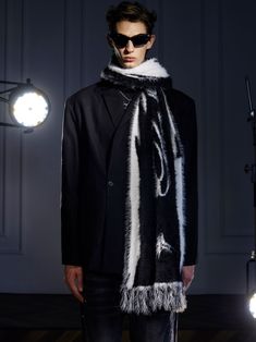 The Frost Scarf features a wool blend construction with an inverted intarsia-knit logo at each side. Fringed detail in black and white at ends. Finished off with signature GRKC garment labels. 184cm x 42cm Limited Quantities Unisex Black Wool Jacquard Knit Outerwear, Garment Labels, Wool Blend, Wool, Black And White, Knitting, Black