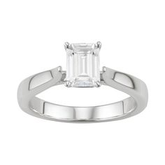 Stunning beauty is effortless with this exquisite lab-created moissanite emerald-cut solitare ring.RING DETAILS Width: 7.0 mm. Metal: rhodium-plated 14k white gold Includes: gift box & warranty card By Charles & Colvard  STONE DETAILS Stone type: lab-created moissanite Total weight diamond equivalent: 1 ct. Cut:emerald Setting: prong  Diamond equivalent carat (ct.) Total Weight (T.W.) represents the approximate total weight of diamonds of equivalent appearance.Please note, due to the hig Anniversary Platinum Emerald Ring With Brilliant Cut, Anniversary Emerald Ring With Brilliant Cut In Platinum, White Gold Emerald Ring With Brilliant Cut, Platinum Emerald Ring With Vvs Clarity, Vvs Clarity Emerald Ring In Platinum White Gold, White Emerald Cut Platinum Emerald Ring, Modern Emerald Ring With Gia Certified Diamond, Gia Certified Platinum Emerald Ring In White Gold, Modern White Gold Emerald Ring With Vvs Clarity