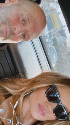 two people sitting next to each other in a car, one wearing sunglasses and the other with long blonde hair