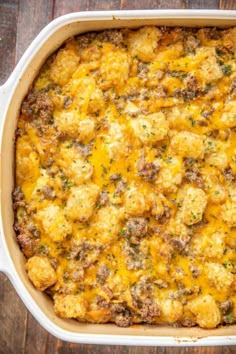 sausage cream cheese breakfast casserole in a white dish with the title above it