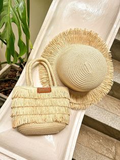 🌿 Product Name: Mini Fringe Elegance Straw Bag and Hat Set 🌞 Product Description: Elevate your summer style with our Mini Fringe Elegance Straw Bag and Hat Set. This exquisite handwoven set is perfect for beach outings, picnics, or casual strolls in the sun. 🌟 Set Includes: 1. Handwoven Straw Bag: ✨ Features: Versatile design perfect for carrying as a clutch. 🎀 Design: Adorned with charming fringes, giving it a playful yet elegant look. 📐 Bag Dimensions: *Height: Approximately 16 CM *Width: Bohemian Summer Straw Bag With Fringe, Bohemian Jute Straw Bag For Vacation, Bohemian Straw Bag For The Beach, Adjustable Straw Bag For Vacation, Bohemian Straw Bag With Fringe For Beach, Spring Beach Bag With Fringe, Casual Fringe Beach Bag For Vacation, Bohemian Straw Bag With Tassels For Beach Season, Bohemian Straw Bag With Tassels For Vacation