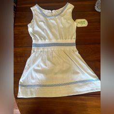 Super Rare New With Tags, Sphairistike Pro Shop White Tennis Dress With Light Blue Accents. Elastic Waist, Long Zipper In Back With Clasp At Top. Light Blue Design In Elastic Waist And Hems On Neckline And At Bottom Of Dress. Lace Detail Under Bottom Hem Of Dress, Has Amazing Attention To Detail. No Flaws But Can Tell It's Vintage, Older Appearance, No Stains/Smell Or Anything Like That But Just Has An Older Feel/Tint? Super Well Made, Classic And Timeless. Sphairistike First Name Is Tennis Dres White Tennis Dress, Top Light, Tennis Dress, First Name, Blue Accents, Blue Design, Dress Lace, Lookbook Outfits, White Shop