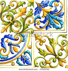 decorative tiles with flowers and leaves painted on them in blue, yellow and green colors