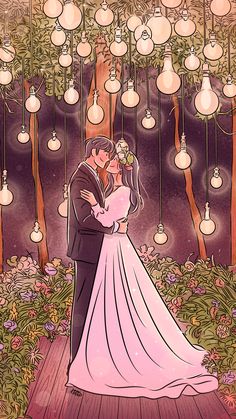 a bride and groom standing in front of a tree filled with hanging lights