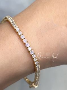 DETAILS: * Handmade item * Gemstone: Lab-grown Diamonds * Band Color: Gold (may vary on gold selection) * Condition: Never been Used; Made to order, Recycled Metal, Conflict-free 100% DESCRIPTION:  💎 Welcome to the Our Shop, Congratulations 🍾 on discovering us. 💎  Beautiful and Elegant, this women's Gold Tennis bracelet is a must-have. This custom-made to-order lab-grown diamond tennis bracelet is the perfect gift for all you beauties who love sparkle and shine. A row of scintillating lab-created round brilliant diamonds are lined up perfectly to create the most stunning diamond bracelet. Made with a double secure lock at the back. Thanks to our trained gemologist who inspects every one of them! A popular cut, this style has become one of today's favorites because it not only shines bri Yellow Gold Bracelet With Prong Setting, Dazzling Gold Jubilee Bracelet As Gift, Dainty Yellow Gold Diamond Bracelet With Prong Setting, 14k Gold Jubilee Tennis Bracelet For Wedding, Dazzling Gold Tennis Bracelet Bangle, Dazzling Gold Tennis Bangle Bracelet, Rose Gold Tennis Bracelet With Prong Setting For Wedding, Rose Gold Tennis Bracelet For Wedding With Prong Setting, Dazzling Gold Tennis Bracelet