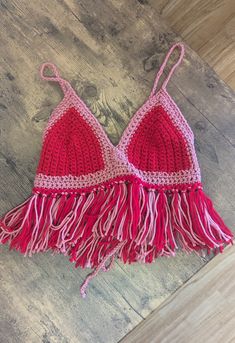 This is a fully crocheted crop top with adjustable straps and an adjustable under bust. The fringe provides a little more coverage than your classic crop /bra top. The top does have stretch, but based on the cup size, this is most suitable for sizes S/M. Crocheted Crop Top, Vintage Valentines Day, Pink Starburst, Crochet Size, Crop Bra, The Fringe, Crop Top Bra, Cropped Tube Top, Staten Island