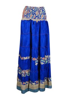 Embrace your free-spirited side with our Navy Blue Floral Boho Chic 2 in 1, Maxi Skirt Dress designed for the modern soul who loves to blend comfort and style. This flowing, maxi-length skirt features floral prints and earthy tones, perfect for creating a laid-back yet hippie-style look. Handcrafted with care, the skirt boasts tiered layers, ruched waist that can be pulled up as a strapless dress and subtle, giving it a graceful, gypsy flair. Whether you're strolling on the beach or attending a Flowy Hippie Maxi Skirt For Vacation, Flowy Ankle-length Skirt For Vacation, Bohemian Maxi Skirt For Beach Season, Flowy Hippie Maxi Skirt For Beach, Ankle-length Maxi Skirt For Beach, Beach Ankle-length Maxi Skirt, Flowy Blue Skirt For The Beach, Ankle-length Maxi Skirt For Vacation, Bohemian Long Maxi Skirt For Beach Season