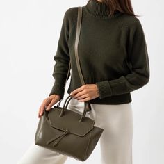 This stylish and effortless medium size bag is handcrafted in Italy with premium quality leather, making it lightweight yet durable. It's easy to clean and maintain, so it'll stay looking as good as new for years to come. With its timeless design and classic look, this tote bag will be a timeless addition to your wardrobe. Whether you're heading out for the day, or going away for the weekend, this midi purse is sure to turn heads wherever you go. Timeless Top Handle Satchel For Everyday, Classic Satchel For Daily Use, Timeless Everyday Top Handle Satchel, Classic Fall Satchel For Daily Use, Timeless Top Handle Bag For Fall, Modern Satchel For Everyday Use, Timeless Fall Bag For Everyday Use, Timeless Everyday Bag For Fall, Timeless Everyday Fall Bag